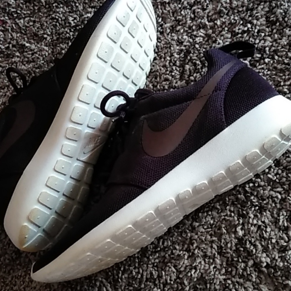 Woman's nikes dark purple